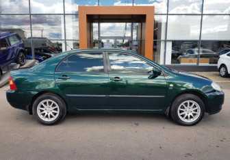 Подержанный автомобиль Toyota Corolla Sedan 2003 года (4 фото)