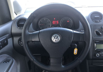 Подержанный автомобиль Volkswagen Caddy Compactvan 2010 года (12 фото)