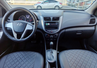 Подержанный автомобиль Hyundai Solaris Sedan 2013 года (15 фото)