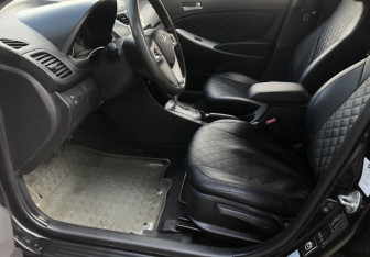 Подержанный автомобиль Hyundai Solaris Sedan 2013 года (9 фото)