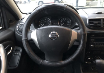 Подержанный автомобиль Nissan Terrano 2014 года (13 фото)
