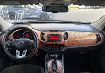 Подержанный автомобиль Kia Sportage 2011 года (11 фото)