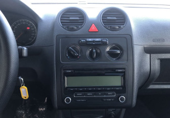 Подержанный автомобиль Volkswagen Caddy Compactvan 2010 года (13 фото)