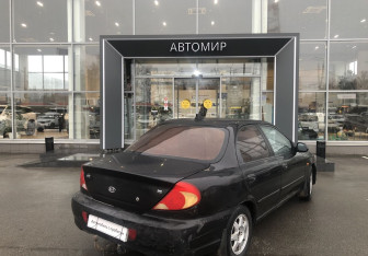 Подержанный автомобиль Kia Spectra Sedan 2006 года (5 фото)