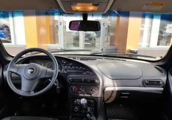 Подержанный автомобиль Chevrolet Niva 2014 года (11 фото)