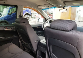 Подержанный автомобиль SsangYong Kyron 2013 года (10 фото)