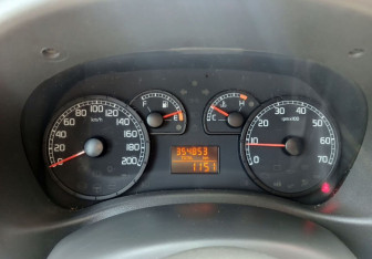 Подержанный автомобиль Fiat Doblo 2011 года (12 фото)