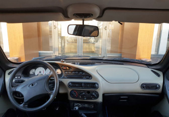 Подержанный автомобиль Chevrolet Niva 2006 года (11 фото)