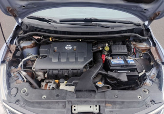 Подержанный автомобиль Nissan Tiida Sedan 2012 года (11 фото)