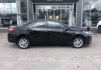 Подержанный автомобиль Toyota Corolla Sedan 2013 года (4 фото)