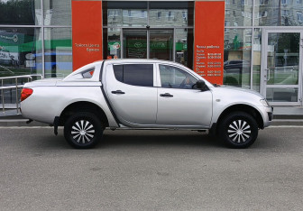 Подержанный автомобиль Mitsubishi L200 2011 года (4 фото)