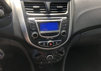 Подержанный автомобиль Hyundai Solaris Sedan 2013 года (13 фото)