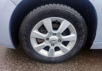 Подержанный автомобиль Nissan Tiida Sedan 2012 года (10 фото)