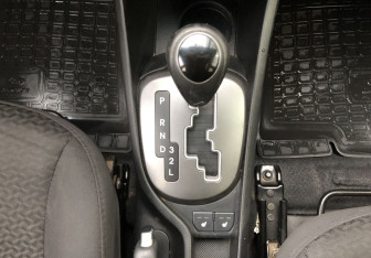 Подержанный автомобиль Kia Rio Sedan 2015 года (15 фото)