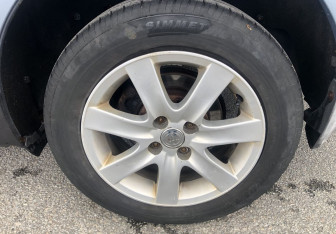 Подержанный автомобиль Toyota Corolla Sedan 2003 года (13 фото)