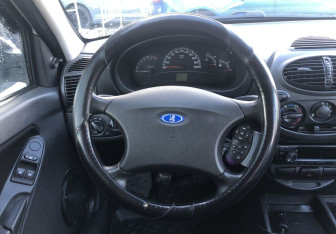 Подержанный автомобиль LADA (ВАЗ) Kalina Hatchback 2013 года (12 фото)