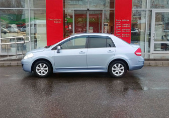 Подержанный автомобиль Nissan Tiida Sedan 2012 года (8 фото)