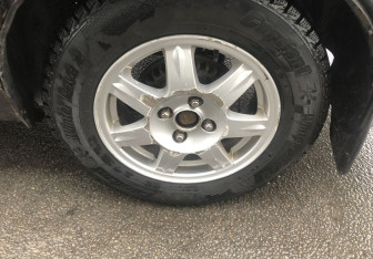 Подержанный автомобиль Kia Spectra Sedan 2006 года (13 фото)