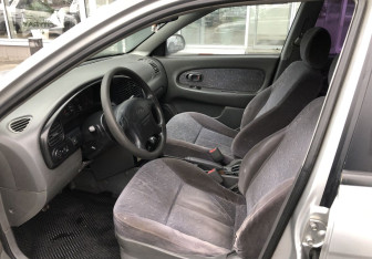 Подержанный автомобиль Kia Spectra Sedan 2007 года (9 фото)