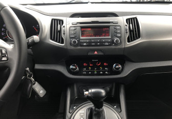 Подержанный автомобиль Kia Sportage 2012 года (14 фото)