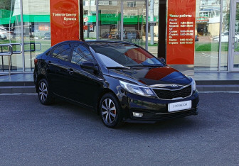 Подержанный автомобиль Kia Rio Sedan 2015 года (3 фото)