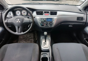 Подержанный автомобиль Mitsubishi Lancer Sedan 2007 года (15 фото)