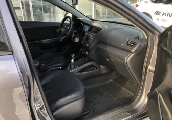 Подержанный автомобиль Kia Rio Sedan 2012 года (9 фото)