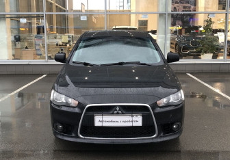 Подержанный автомобиль Mitsubishi Lancer Sedan 2012 года (2 фото)