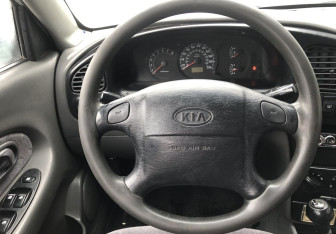 Подержанный автомобиль Kia Spectra Sedan 2007 года (12 фото)