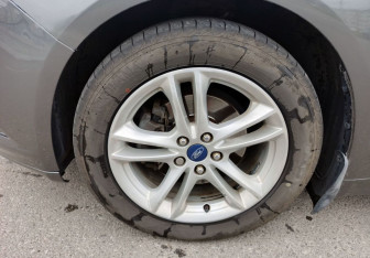 Подержанный автомобиль Ford Mondeo Sedan 2015 года (10 фото)