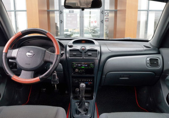 Подержанный автомобиль Nissan Almera Classic 2006 года (11 фото)