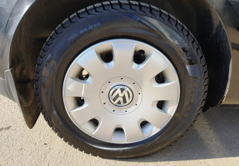 Подержанный автомобиль Volkswagen Touran 2004 года (13 фото)