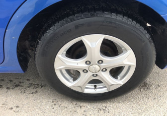 Подержанный автомобиль Chevrolet Aveo Sedan 2013 года (15 фото)