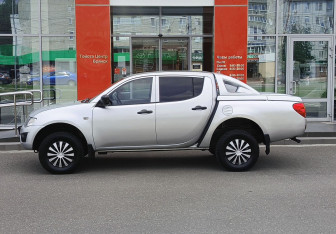 Подержанный автомобиль Mitsubishi L200 2011 года (8 фото)