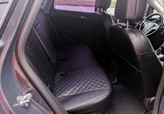 Подержанный автомобиль Opel Astra Sedan 2013 года (15 фото)