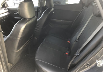 Подержанный автомобиль Kia Rio Sedan 2012 года (11 фото)