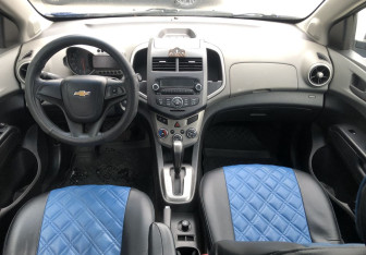 Подержанный автомобиль Chevrolet Aveo Sedan 2013 года (10 фото)