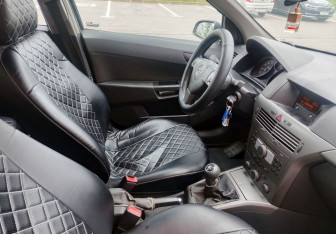 Подержанный автомобиль Opel Astra Wagon 2004 года (14 фото)