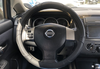 Подержанный автомобиль Nissan Tiida Sedan 2007 года (12 фото)