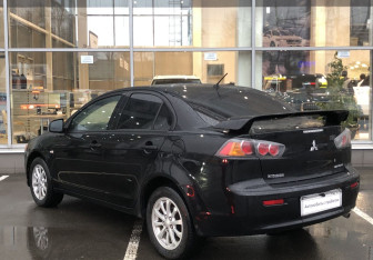 Подержанный автомобиль Mitsubishi Lancer Sedan 2012 года (7 фото)