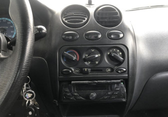 Подержанный автомобиль Daewoo Matiz 2009 года (13 фото)