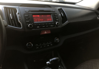 Подержанный автомобиль Kia Sportage 2011 года (14 фото)