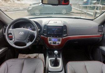 Подержанный автомобиль Hyundai Santa Fe 2009 года (15 фото)