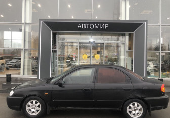 Подержанный автомобиль Kia Spectra Sedan 2006 года (8 фото)