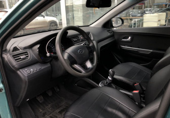 Подержанный автомобиль Kia Rio Sedan 2012 года (9 фото)