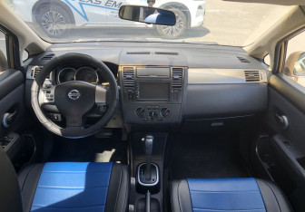 Подержанный автомобиль Nissan Tiida Sedan 2007 года (10 фото)