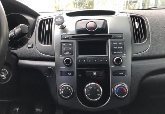 Подержанный автомобиль Kia Cerato Sedan 2010 года (14 фото)